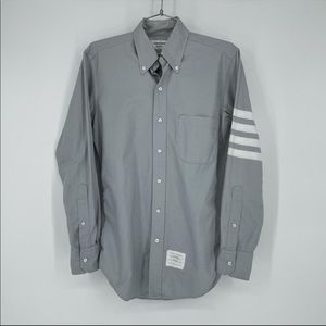 THOM BROWNE COLLARED GRAY SHIRT W/ 4 STRIPE WHITE ARMBAND